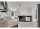 Spacious kitchen with a center island and an open layout to the living area at 921 Costa Mesa Ln, Kissimmee, FL 34744