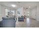 Comfortable living room featuring neutral paint and tile flooring with natural light at 921 Costa Mesa Ln, Kissimmee, FL 34744