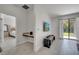 Living room with media center and view to the backyard at 921 Costa Mesa Ln, Kissimmee, FL 34744