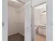 Walk-in closet with shelving, with view into attached full bath at 10438 Sw 85Th Ct, Ocala, FL 34481