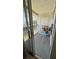 Cozy balcony with a small table, chairs, and outdoor views at 11582 Westwood Blvd # 1428, Orlando, FL 32821