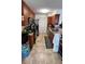 Traditional kitchen showcasing wooden cabinetry, stainless steel appliances, and light countertops at 11582 Westwood Blvd # 1428, Orlando, FL 32821