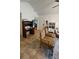 Inviting living room with tiled floors, comfortable seating, and a view of the bedroom at 11582 Westwood Blvd # 1428, Orlando, FL 32821