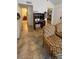 Inviting living room with tiled floors, comfortable seating, and a view of the bedroom and bathroom at 11582 Westwood Blvd # 1428, Orlando, FL 32821