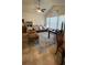 Bright living room with tile flooring, ceiling fan, and comfortable seating at 11582 Westwood Blvd # 1428, Orlando, FL 32821