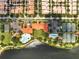 An overhead view of amenities including the pool, tennis courts, and lake at 11937 Bianca Ln, Orlando, FL 32827