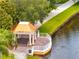 Community gazebo with white railing and brick patio, overlooking the waterfront at 11937 Bianca Ln, Orlando, FL 32827