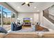Comfortable living room with hardwood floors, stylish seating, and sliding glass doors at 11937 Bianca Ln, Orlando, FL 32827