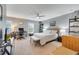 Spacious main bedroom with a ceiling fan, an office space and a king bed at 11937 Bianca Ln, Orlando, FL 32827