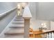 View of a carpeted staircase and second-floor landing, leading to a living area at 11937 Bianca Ln, Orlando, FL 32827