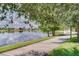 Community waterfront walking path, perfect for a relaxing stroll with lake views at 11937 Bianca Ln, Orlando, FL 32827