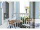 Cozy covered balcony with seating is the perfect place to relax and unwind at 13452 Sagestone Dr, Winter Garden, FL 34787