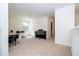 Bright flex space with a desk, piano, and versatile layout at 13452 Sagestone Dr, Winter Garden, FL 34787