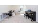 Versatile flex space with a desk, piano, and neutral carpet at 13452 Sagestone Dr, Winter Garden, FL 34787