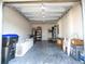 Organized garage space with room for storage, featuring a garage door and ample lighting at 13452 Sagestone Dr, Winter Garden, FL 34787