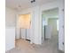 Upstairs laundry nook with washer and dryer, conveniently located near bedrooms for easy chores at 13452 Sagestone Dr, Winter Garden, FL 34787