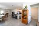 View from living room of half bath, stainless appliances, and breakfast bar at 13452 Sagestone Dr, Winter Garden, FL 34787