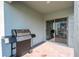 Outdoor patio featuring a grill and brick pavers, ideal for entertaining and enjoying the fresh air at 13452 Sagestone Dr, Winter Garden, FL 34787