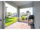 Cozy covered patio with brick pavers, perfect for outdoor dining and relaxation with backyard views at 13452 Sagestone Dr, Winter Garden, FL 34787