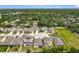 Aerial view shows the neighborhood's well-manicured lawns and neat landscaping at 13842 Pickett Reserve Ct, Orlando, FL 32826