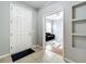 Welcoming entryway with a view of a living space featuring tile floors and neutral walls at 13842 Pickett Reserve Ct, Orlando, FL 32826