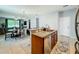Open kitchen featuring granite countertops and seamless access to the living spaces at 13842 Pickett Reserve Ct, Orlando, FL 32826