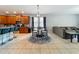 Spacious living area featuring an open floorplan with the kitchen, breakfast bar, and living room visible at 13842 Pickett Reserve Ct, Orlando, FL 32826