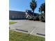 The exterior of a building featuring ample parking and well-maintained landscaping at 1422 Spalding Rd, Winter Springs, FL 32708