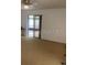 Living room features an outdoor view and a sliding door access at 1422 Spalding Rd, Winter Springs, FL 32708