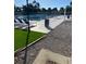 Pool area with artificial turf at 1422 Spalding Rd, Winter Springs, FL 32708