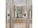 Luxurious bathroom with large tub, natural light, and elegant tile at 1453 Langham Ter, Lake Mary, FL 32746