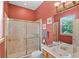 Bathroom featuring a glass enclosed shower and vanity at 1453 Langham Ter, Lake Mary, FL 32746