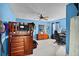Bright bedroom featuring blue painted walls, carpet flooring, and natural lighting at 1453 Langham Ter, Lake Mary, FL 32746