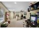 Large bonus room offering carpet flooring, natural lighting, and various entertainment options at 1453 Langham Ter, Lake Mary, FL 32746