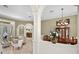 Spacious living area with columns and view to the dining room at 1453 Langham Ter, Lake Mary, FL 32746