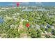 Aerial view of property near downtown Winter Park and Lake Osceola, surrounded by lush trees at 171 Cortland Ave, Winter Park, FL 32789