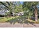 Charming home with mature trees and well-manicured lawn at 171 Cortland Ave, Winter Park, FL 32789