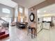 Spacious living and dining area with high ceilings and an open concept to the kitchen at 1803 Meadow Pond Way, Orlando, FL 32824