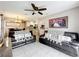 Inviting living room with access to the kitchen and dining area with comfortable leather sofas at 1803 Meadow Pond Way, Orlando, FL 32824