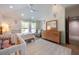 Bedroom featuring whimsical decor, a cozy chair, and ample natural light at 20 Twelve Oaks Trl, Ormond Beach, FL 32174