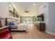 Light-filled bedroom with large windows, wood floors, and stylish furnishings at 20 Twelve Oaks Trl, Ormond Beach, FL 32174