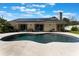 Private pool, outdoor patio, solar panels, and well-maintained landscaping make this backyard a dream at 2122 Palm Crest Dr, Apopka, FL 32712