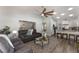 Bright open concept living space with lots of seating, view to the kitchen and dining area at 2122 Palm Crest Dr, Apopka, FL 32712