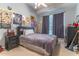 Well-lit bedroom with posters and a comfy bed at 2538 Carter Grove Cir, Windermere, FL 34786