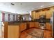 Well-equipped kitchen featuring stainless steel appliances and a breakfast bar at 2538 Carter Grove Cir, Windermere, FL 34786