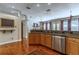 Kitchen featuring stainless appliances and a view into the dining and living areas at 2538 Carter Grove Cir, Windermere, FL 34786