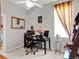 Home office featuring a window and computer setup at 2538 Carter Grove Cir, Windermere, FL 34786
