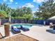 Inviting backyard pool area with comfortable lounge chairs, perfect for relaxation and enjoyment at 2538 Carter Grove Cir, Windermere, FL 34786