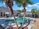 Backyard oasis featuring a spacious pool, spa, patio and meticulous landscaping providing a private retreat at 2538 Carter Grove Cir, Windermere, FL 34786