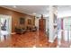Cozy sitting area features hardwood floors and comfortable armchairs at 2538 Carter Grove Cir, Windermere, FL 34786